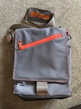 lll Parcel Crossbody Messenger Bag with Orange Accents